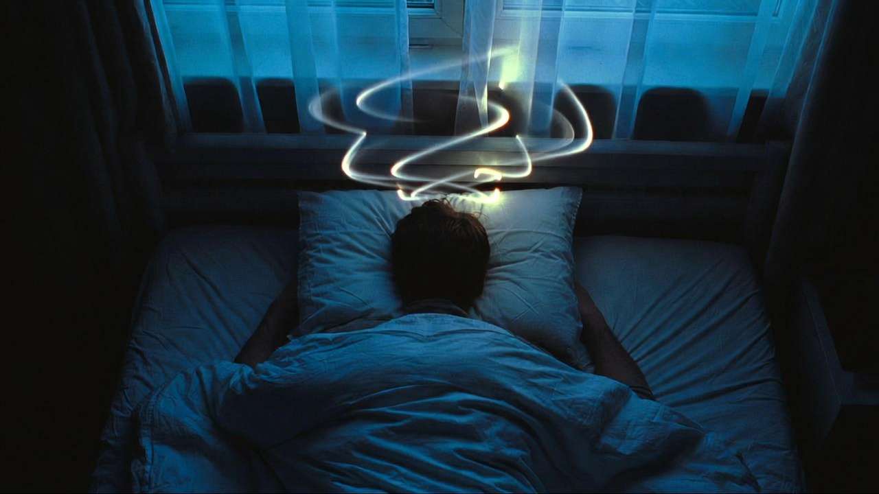 Nighttime overthinking preventing sleep with calm bedroom atmosphere and fading thoughts.
